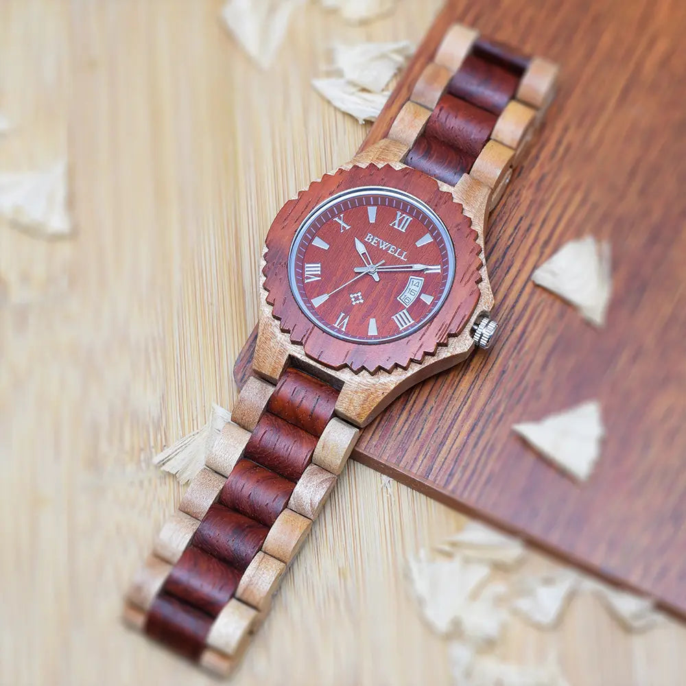 Handcrafted wooden wristwatch with red sandalwood dial and Roman numeral markers displayed on a wooden surface - BlackBole High Quality Watch