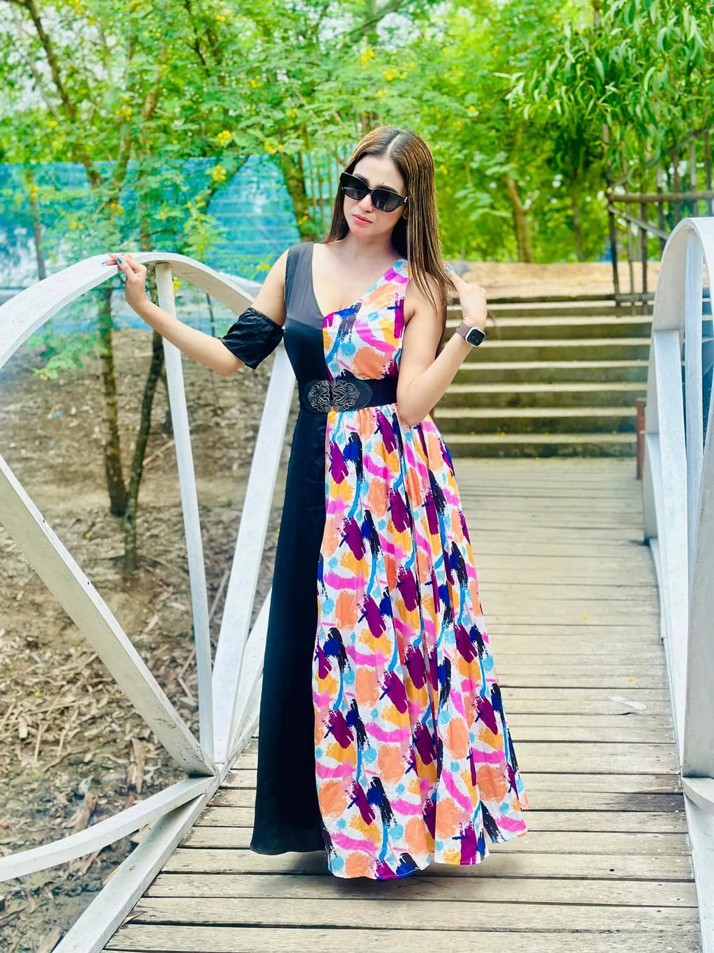 Woman in a colorful dress standing on a wooden bridge with greenery in the background - BlackBole High Quality Western Dress