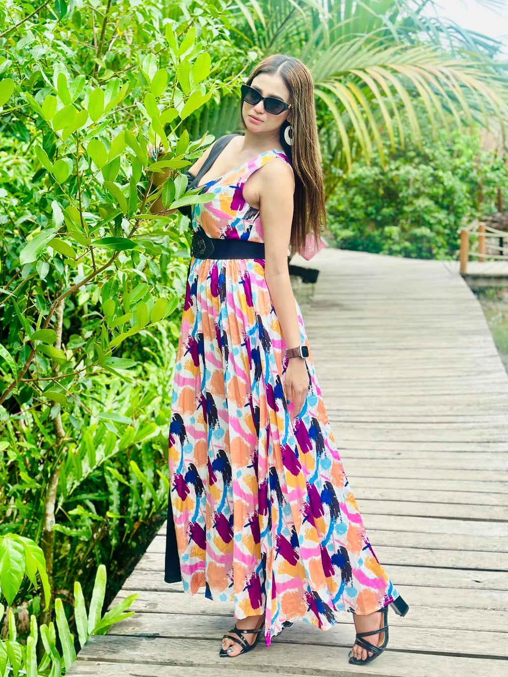 Woman in a colorful dress standing on a wooden boardwalk with greenery in the background - BlackBole High Quality Western Dress