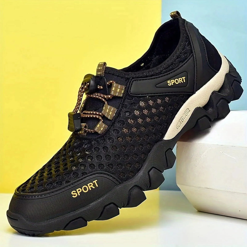 Black sports shoe with gold accents on a multicolored background - BlackBole High Quality Western Shoe