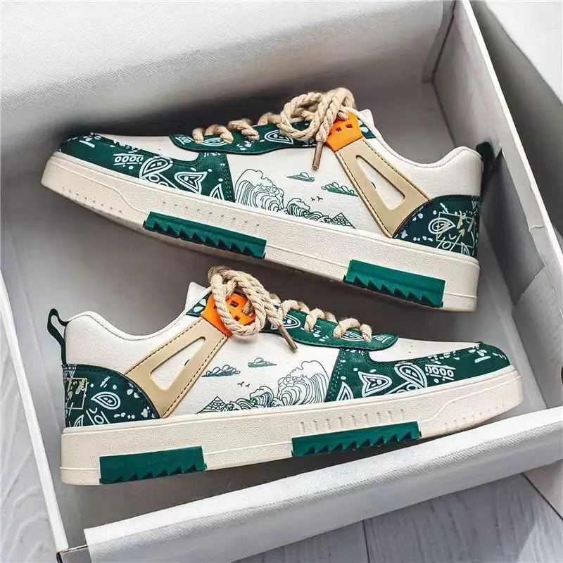 White and green streetwear sneakers with wave and graphic pattern accents, featuring beige panels and orange eyelet details displayed on a box - BlackBole High Quality Shoe