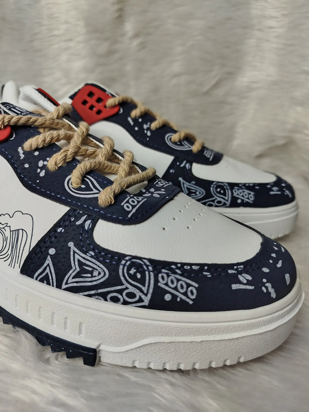 Navy and white sneakers with bandana pattern on a light background - BlackBole High Quality Shoe
