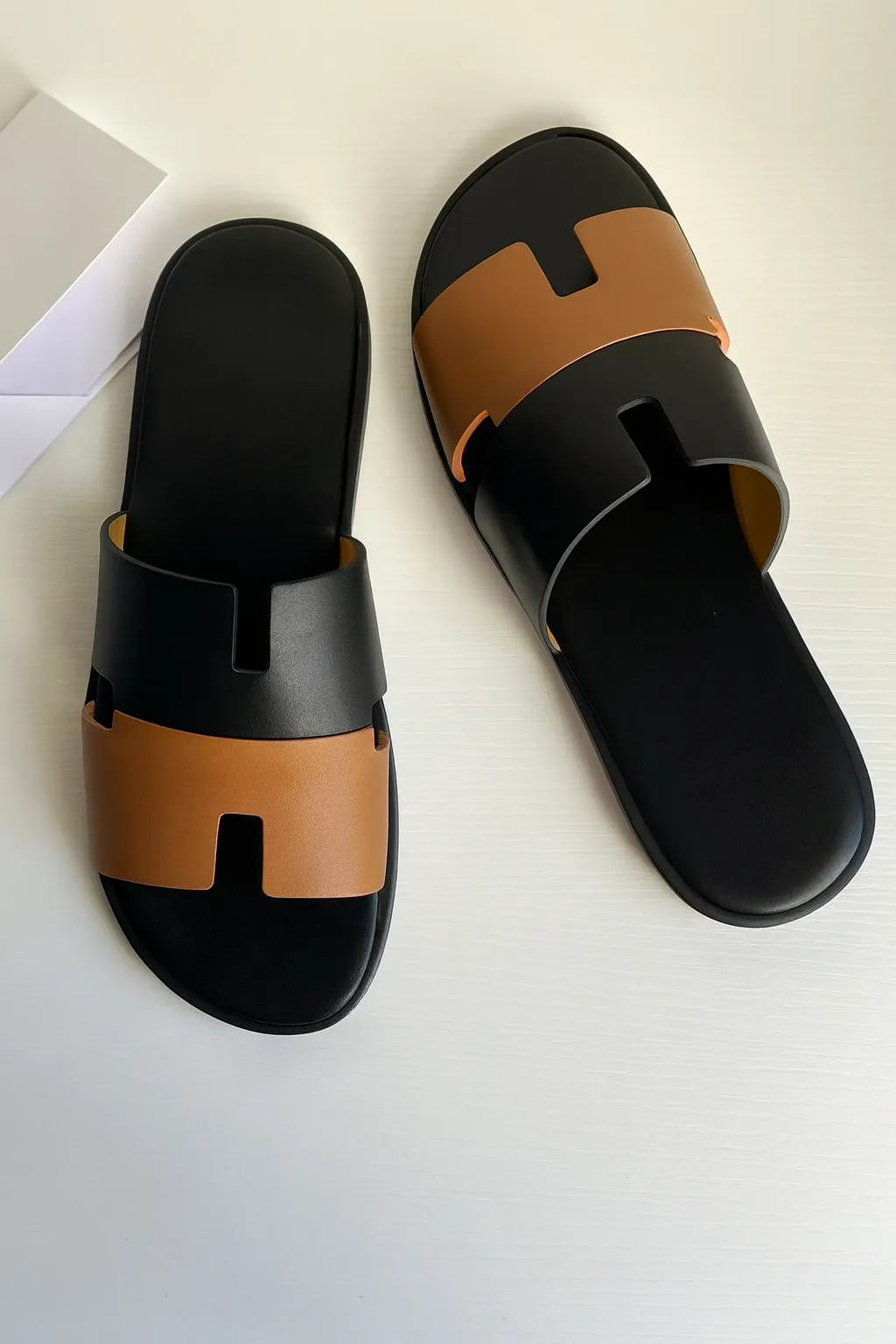 Black and brown slide sandals on a white background - BlackBole High Quality Sandal