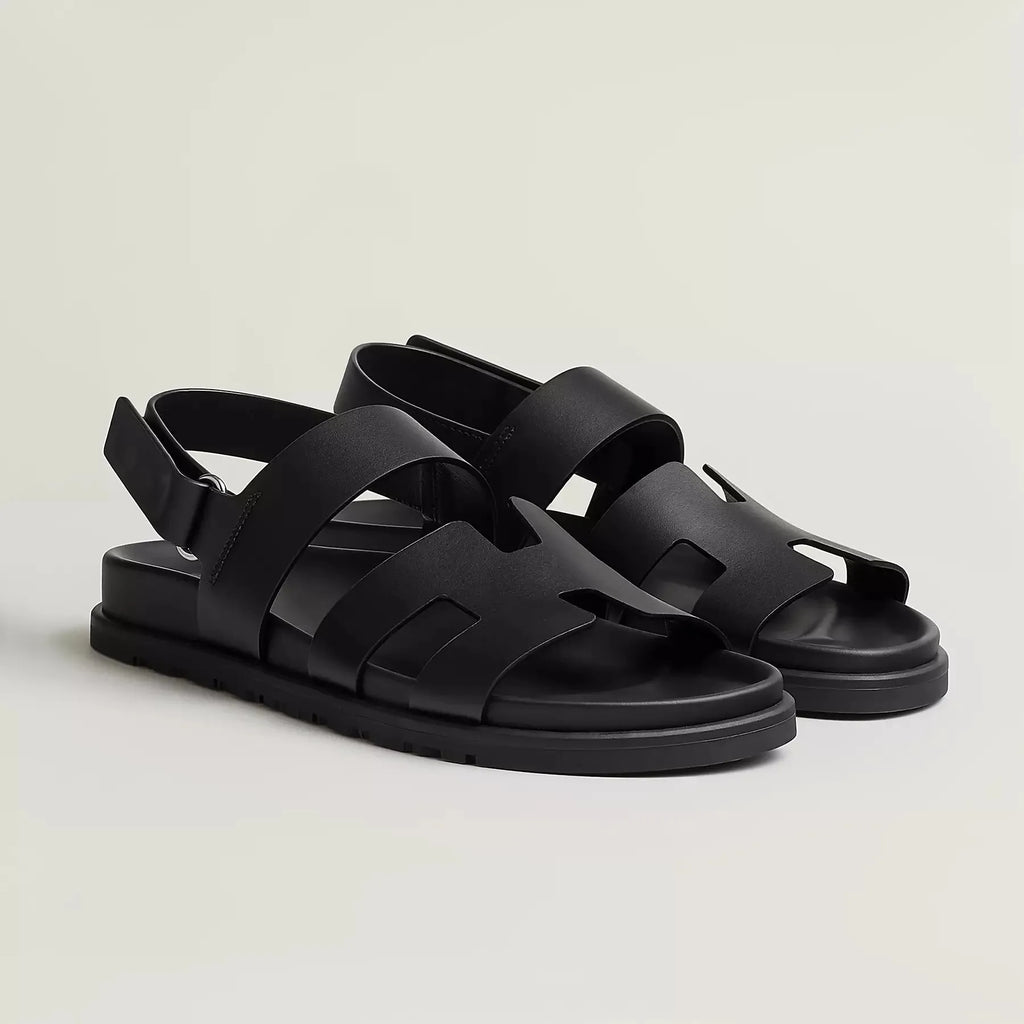 Pair of black sandals on a light gray background - BlackBole High Quality Sandal