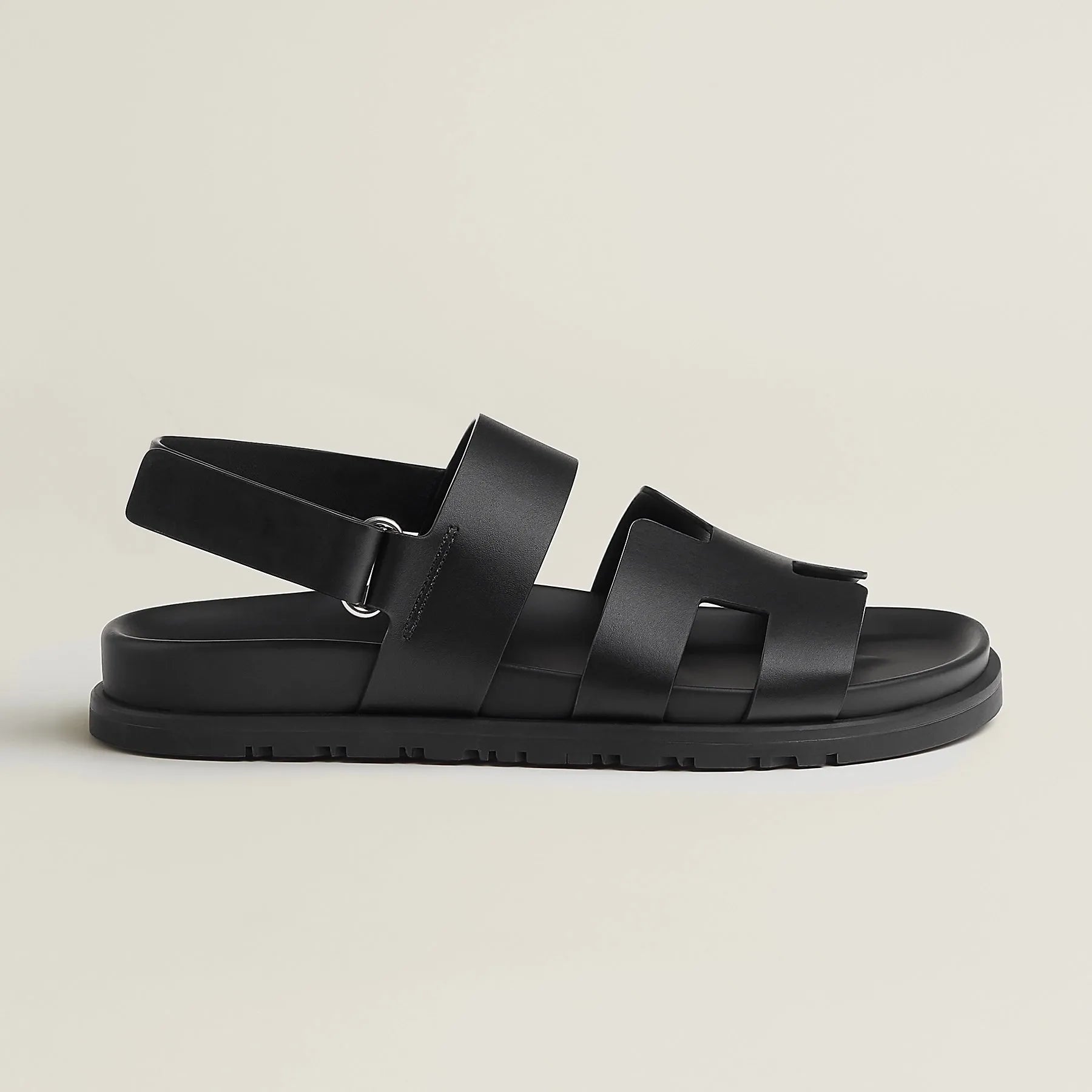 Black sandal with multiple straps on a light beige background - BlackBole High Quality Sandal