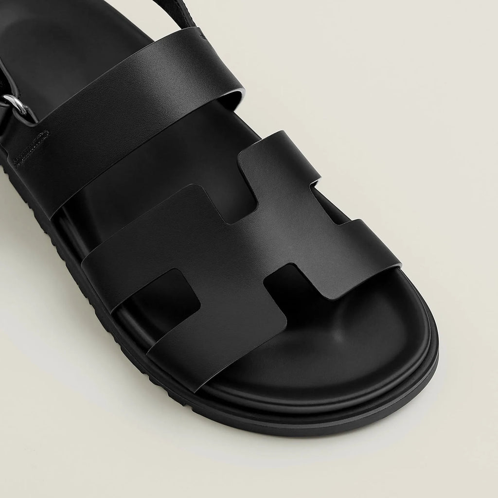Black sandal with multiple straps on a light beige background - BlackBole High Quality Sandal