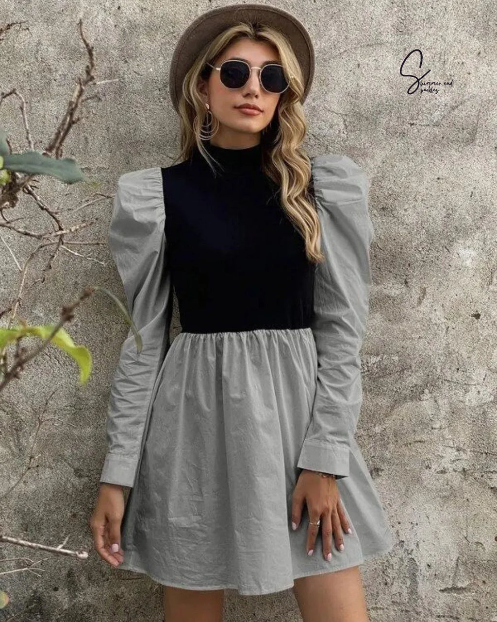 Woman wearing a gray dress over a black top with sunglasses and a hat against a textured wall - BlackBole High Quality Western Dress