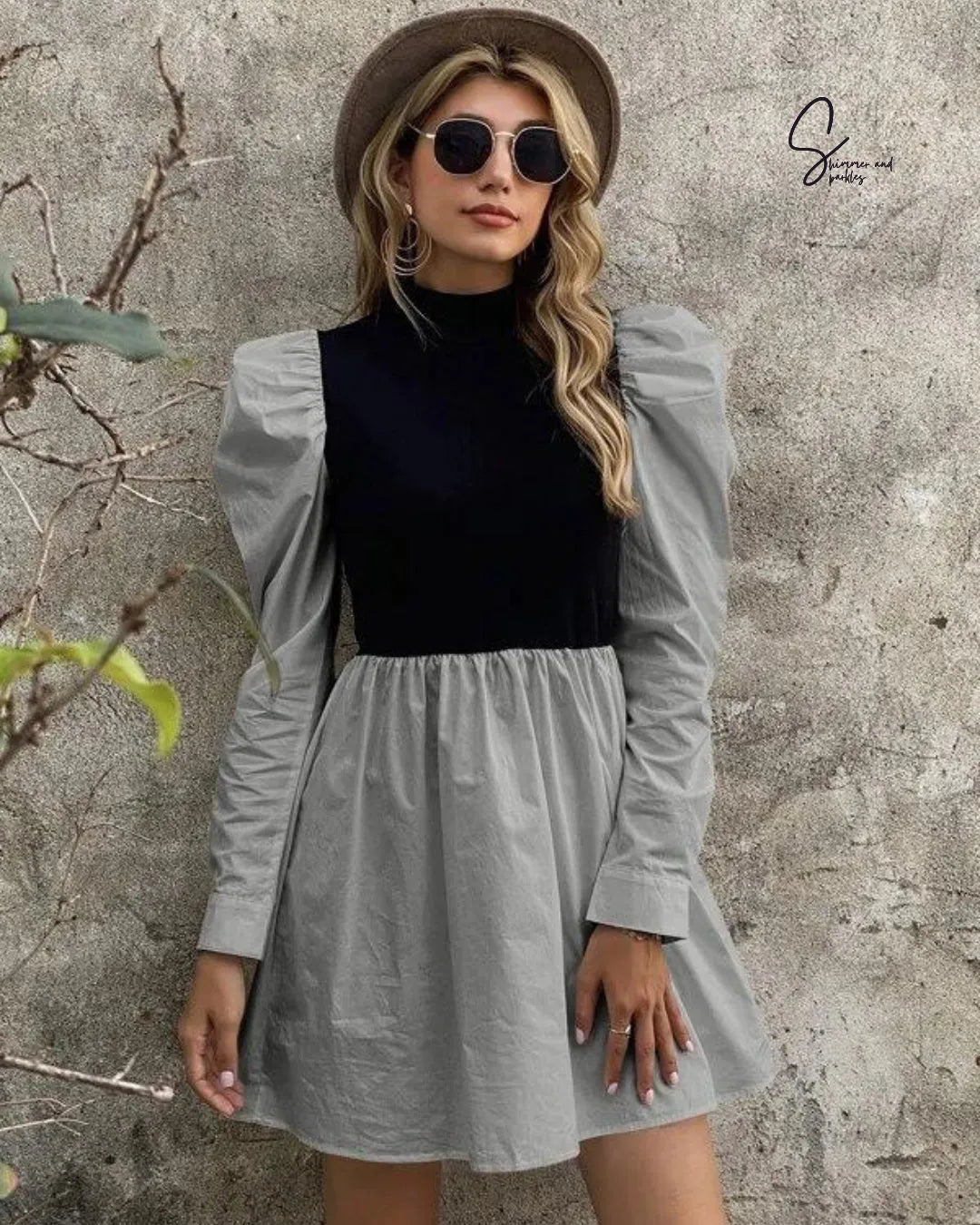 Woman wearing a gray dress over a black top with sunglasses and a hat against a textured wall - BlackBole High Quality Western Dress