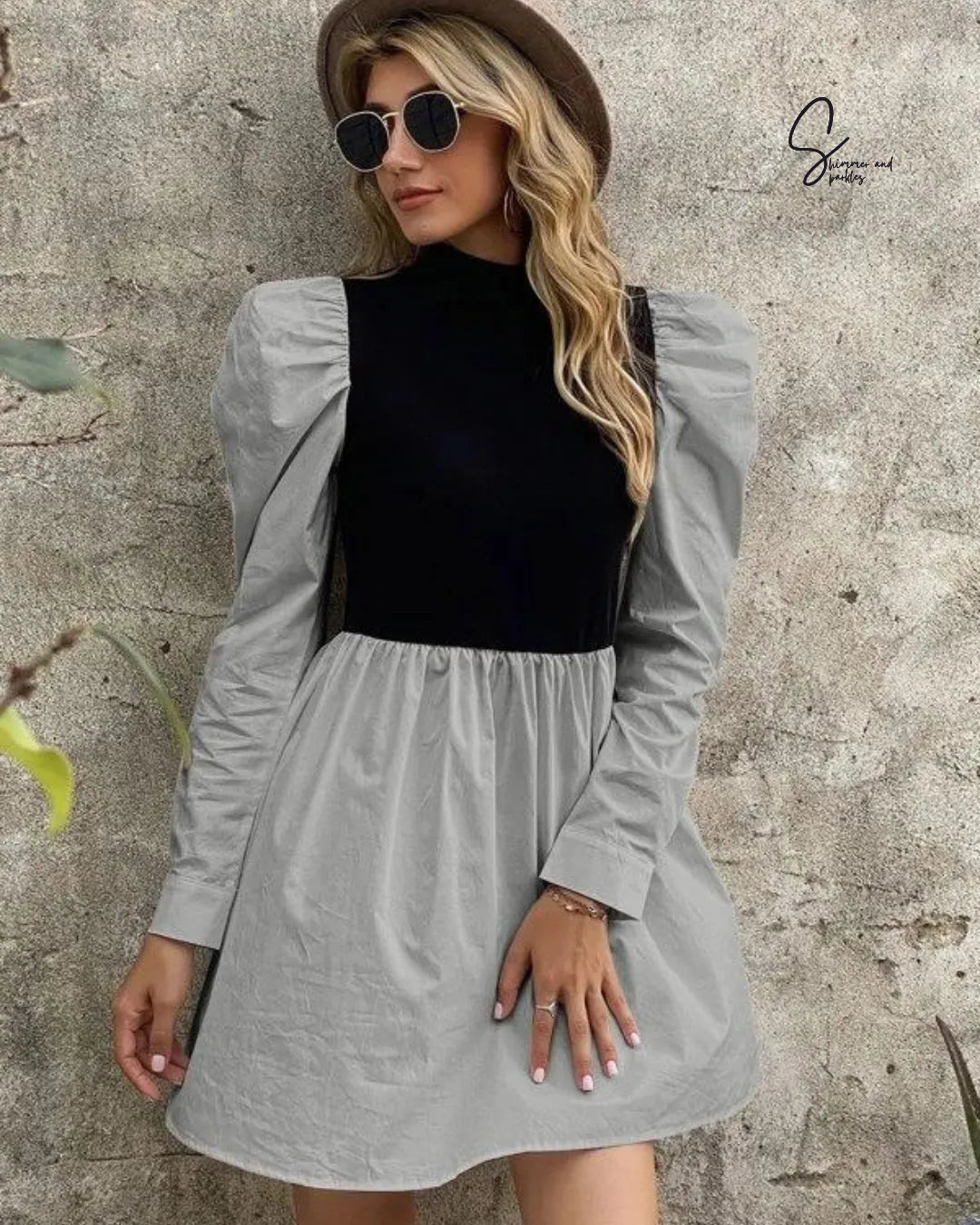 Woman wearing a gray dress over a black top with sunglasses and a hat against a textured wall - BlackBole High Quality Western Dress