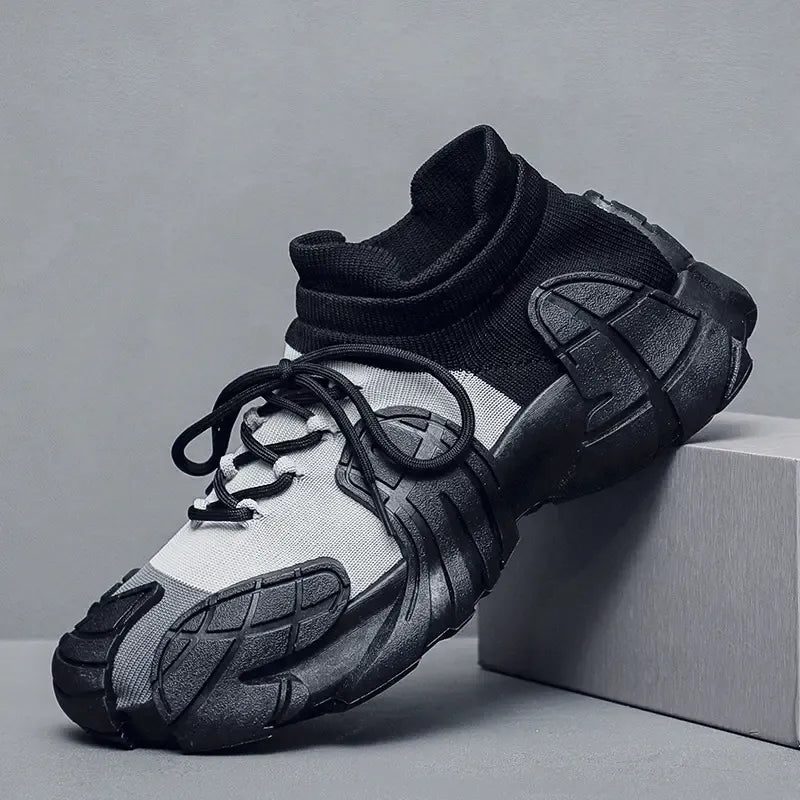 Black and white sneaker on a gray background - BlackBole High Quality Shoe