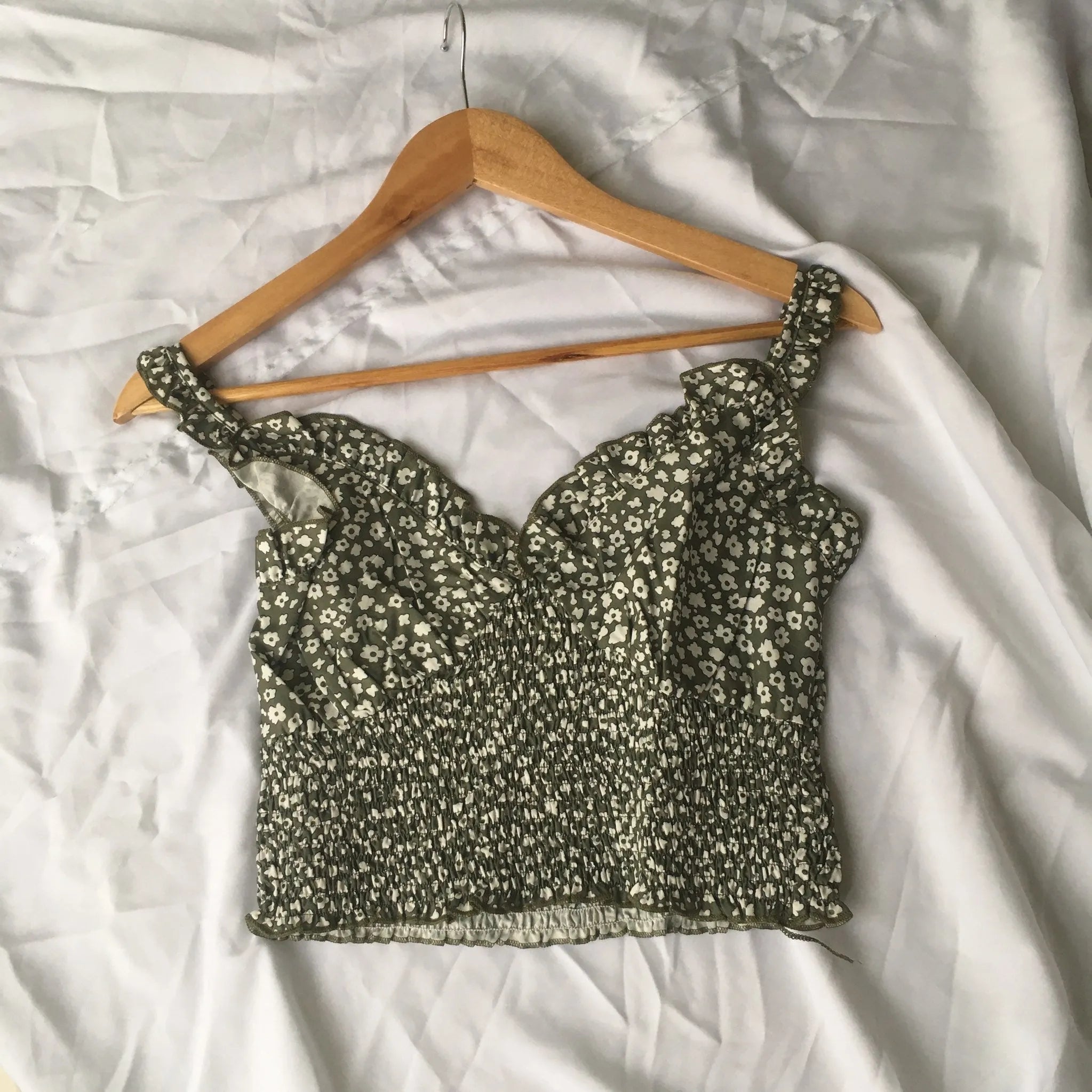 Floral-patterned crop top on a wooden hanger against a white background - BlackBole High Quality western Dress