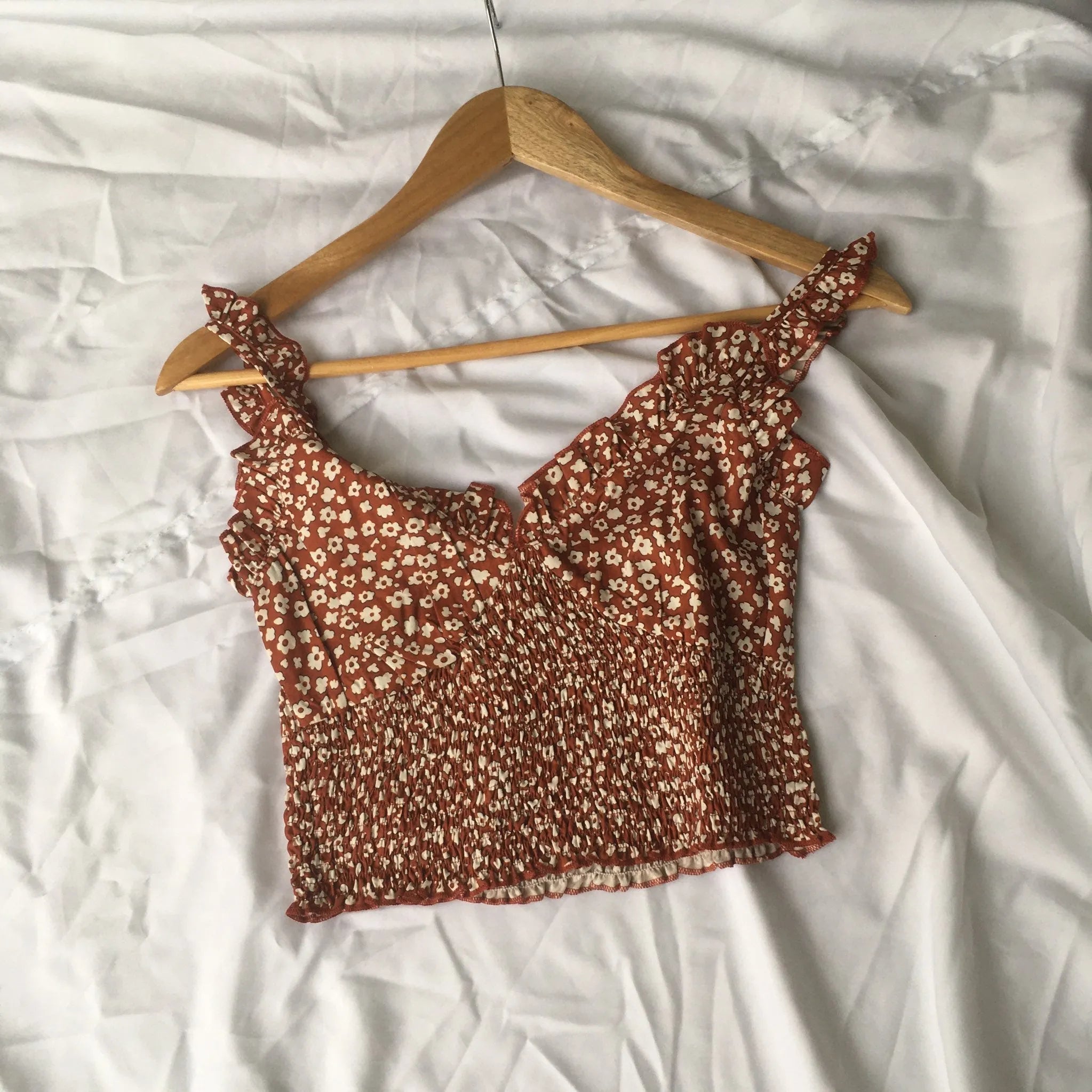 Brown floral crop top on a wooden hanger against a white background - BlackBole High Quality western Dress
