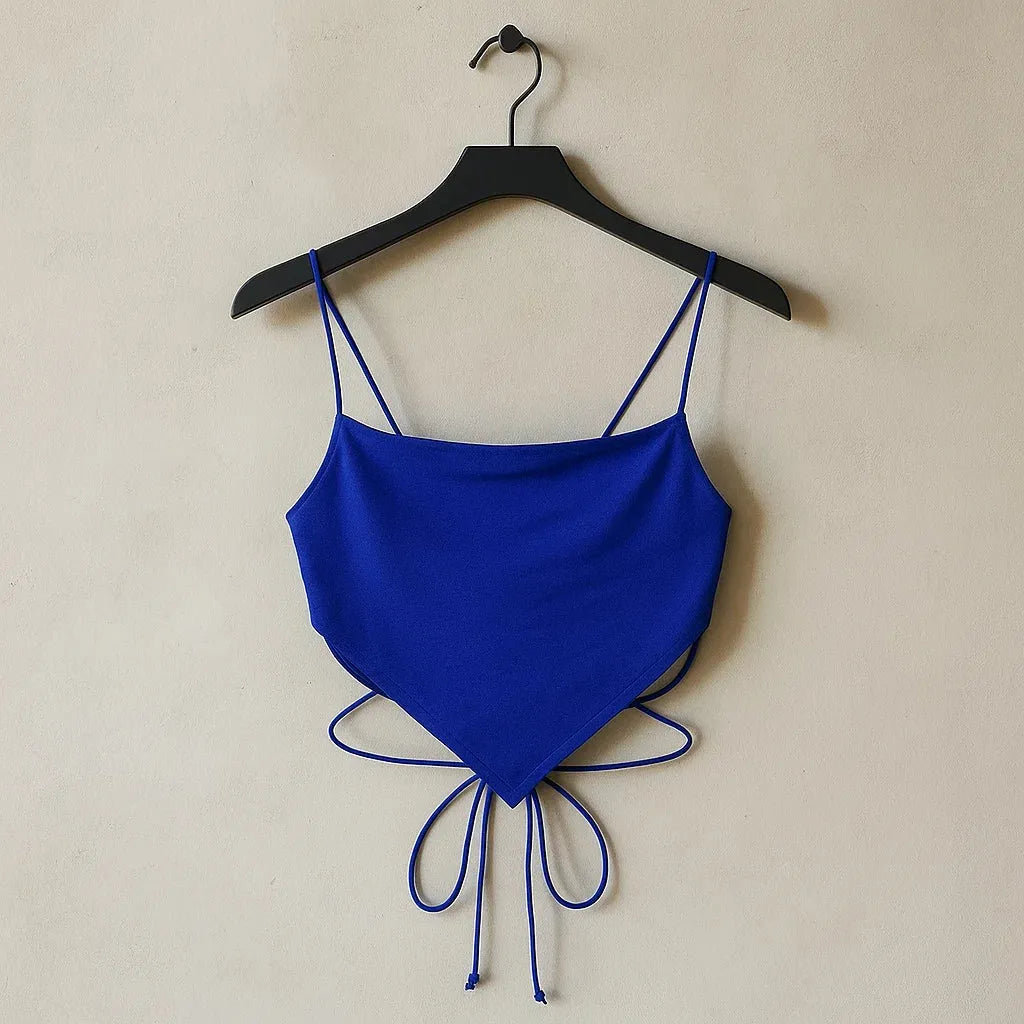 Blue crop top with thin straps on a hanger against a beige wall - BlackBole High Quality Shoe