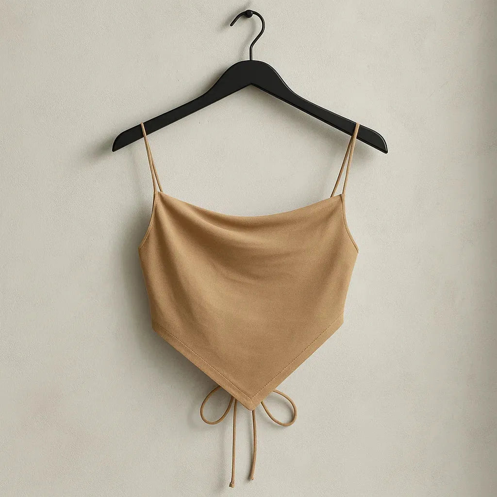 Beige spaghetti strap top on a hanger against a plain background - BlackBole High Quality Shoe