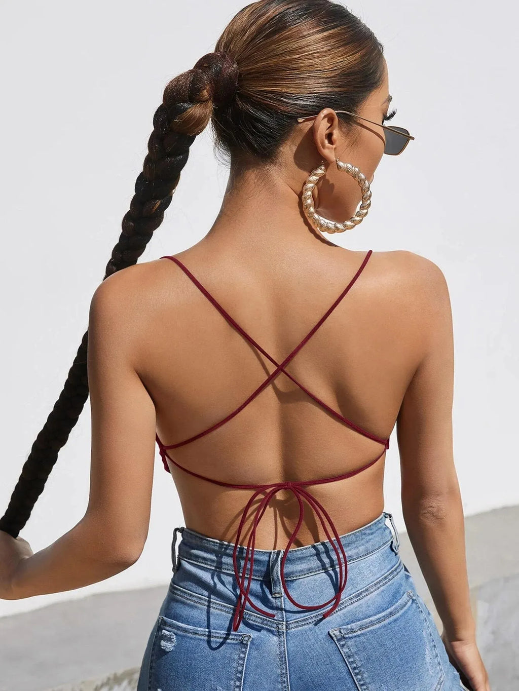 Woman wearing a strappy top and blue jeans with a white background - BlackBole High Quality Western Dress