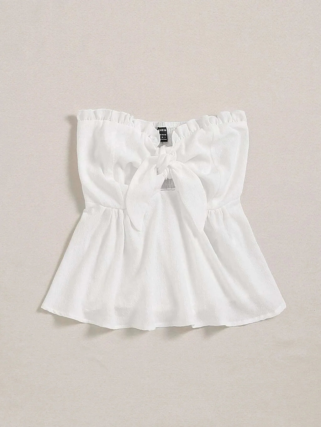 White blouse with a bow detail on a beige background - BlackBole High Quality Western Dress