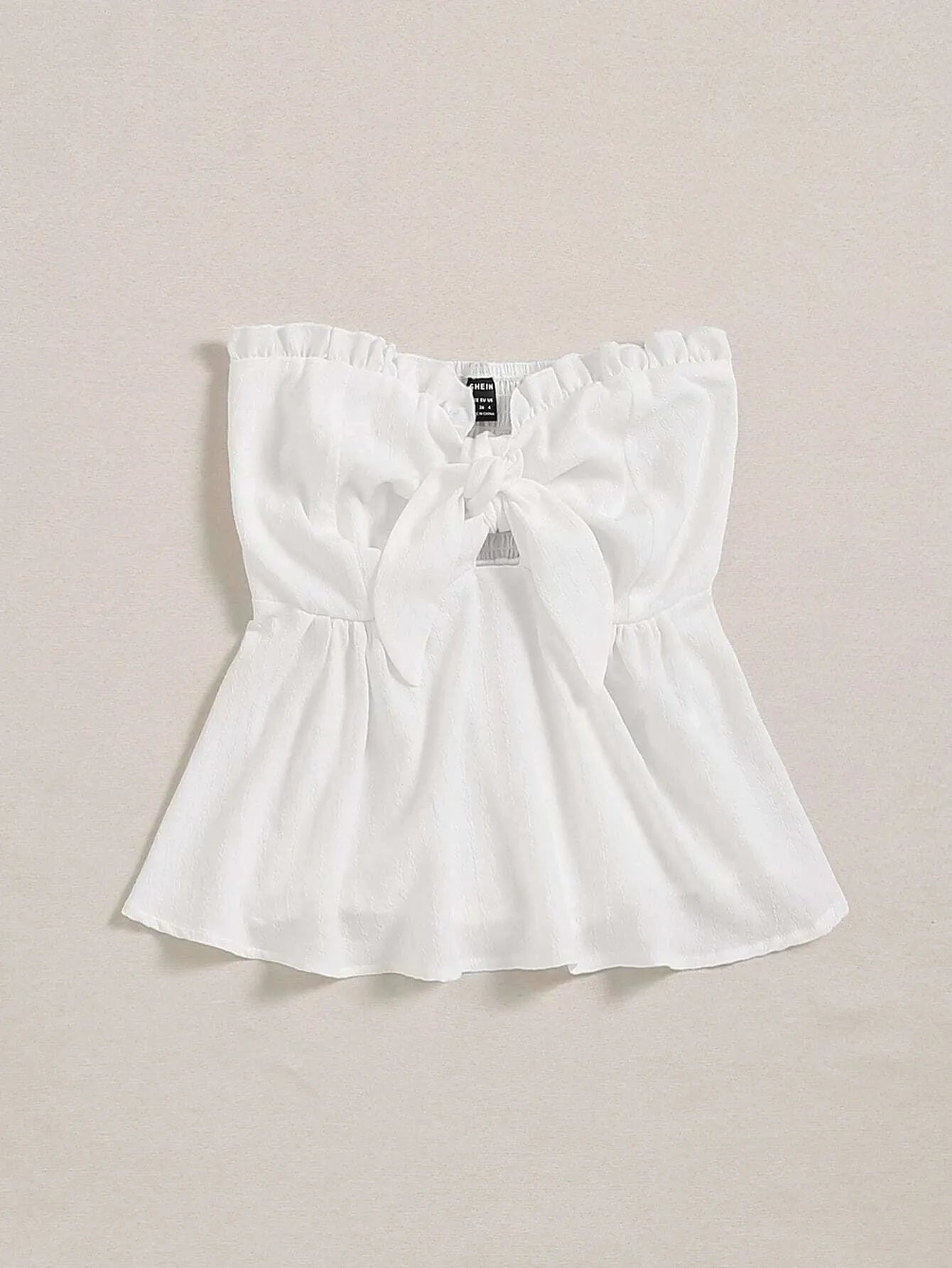 White blouse with a bow detail on a beige background - BlackBole High Quality Western Dress