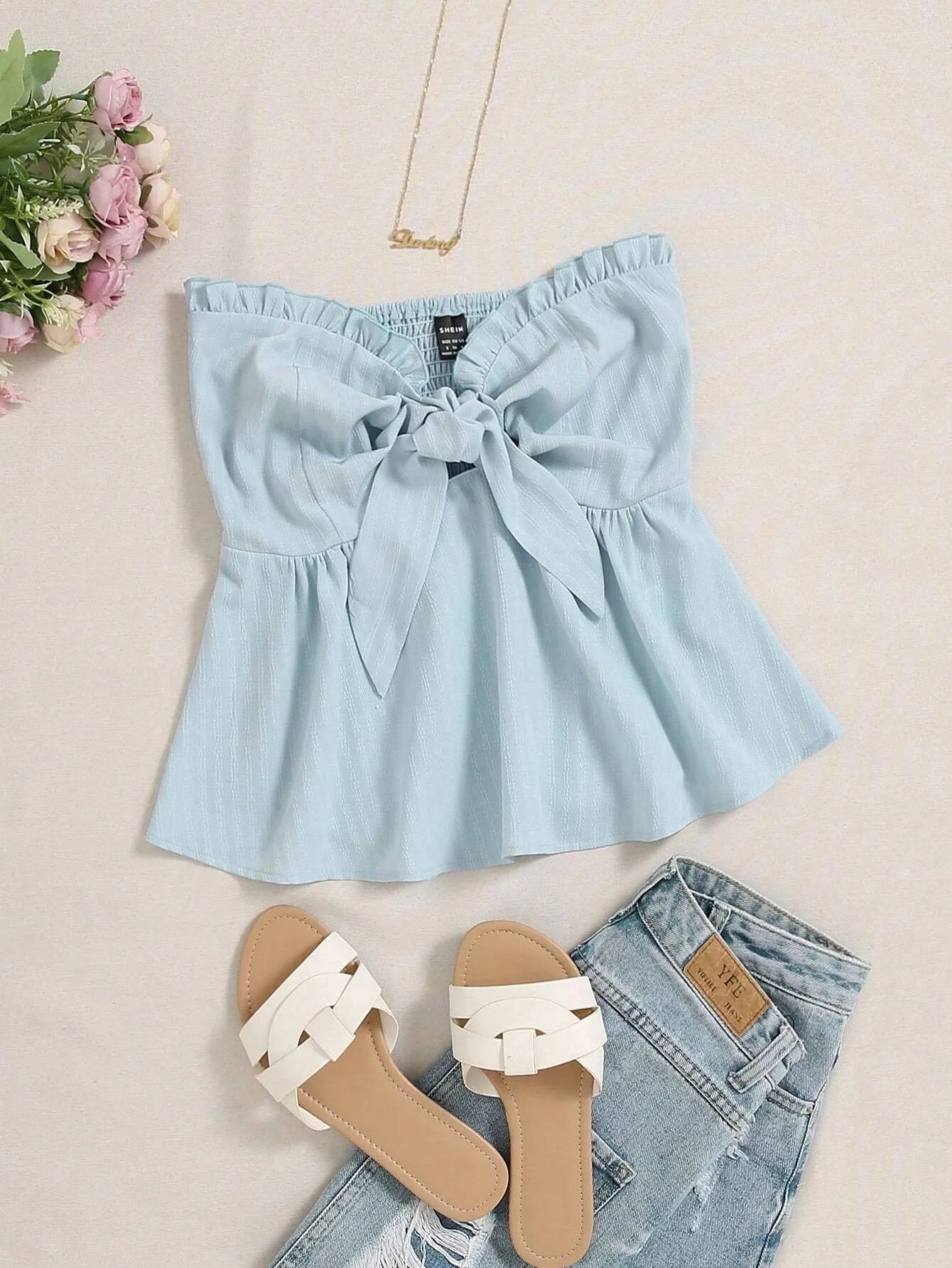 Light blue denim top with a bow, beige sandals, and denim jeans on a beige background - BlackBole High Quality Western Dress