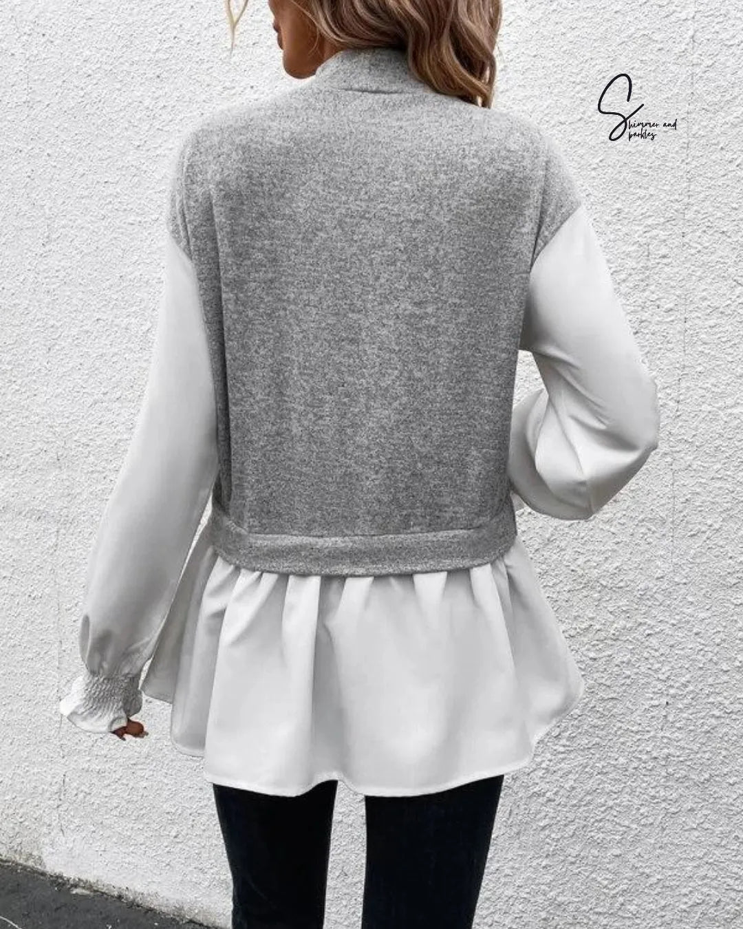 Person wearing a gray vest over a white blouse against a light gray wall - BlackBole High Quality Western Dress