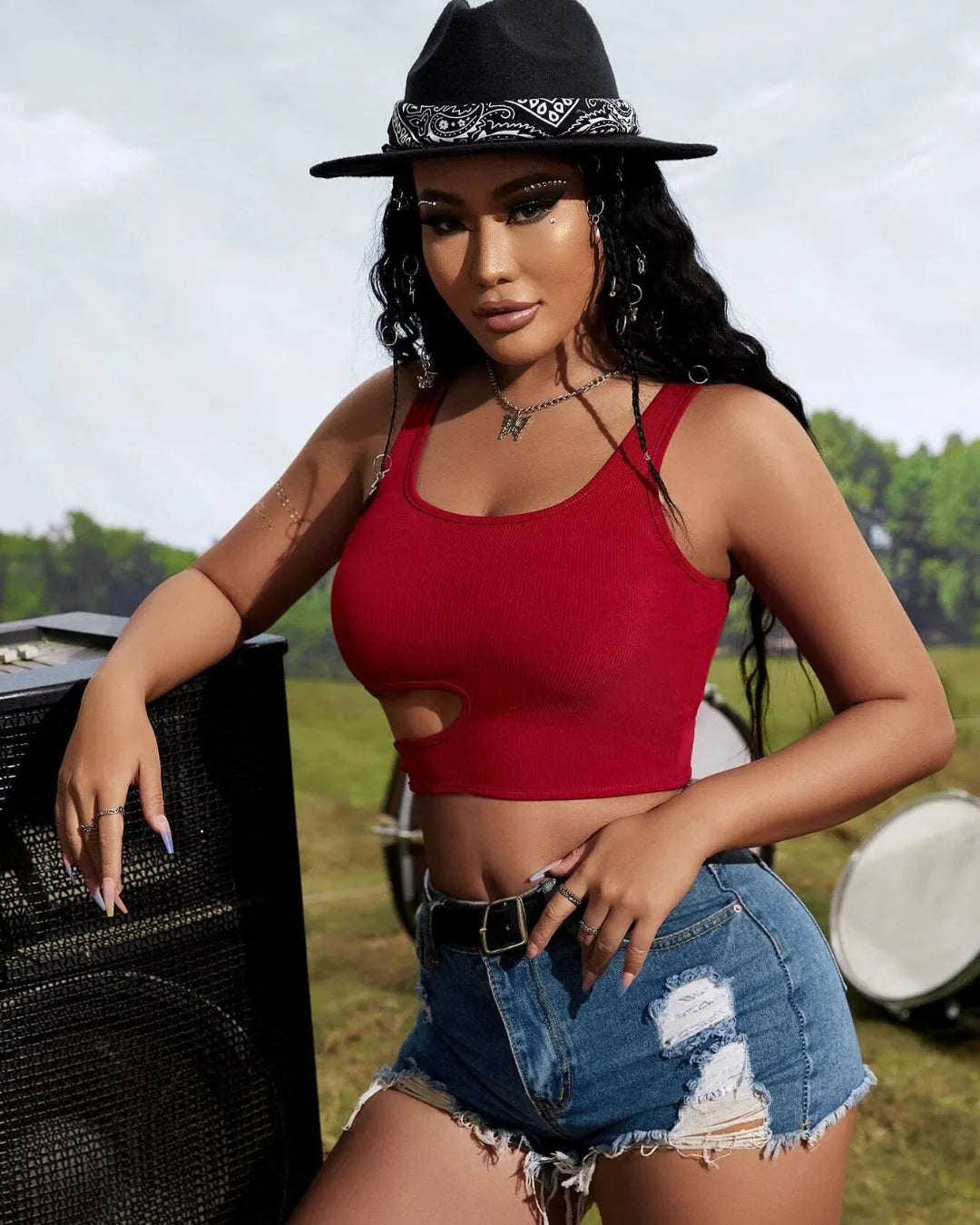 Woman in a red top and denim shorts standing outdoors with musical equipment - BlackBole High Quality Western Dress