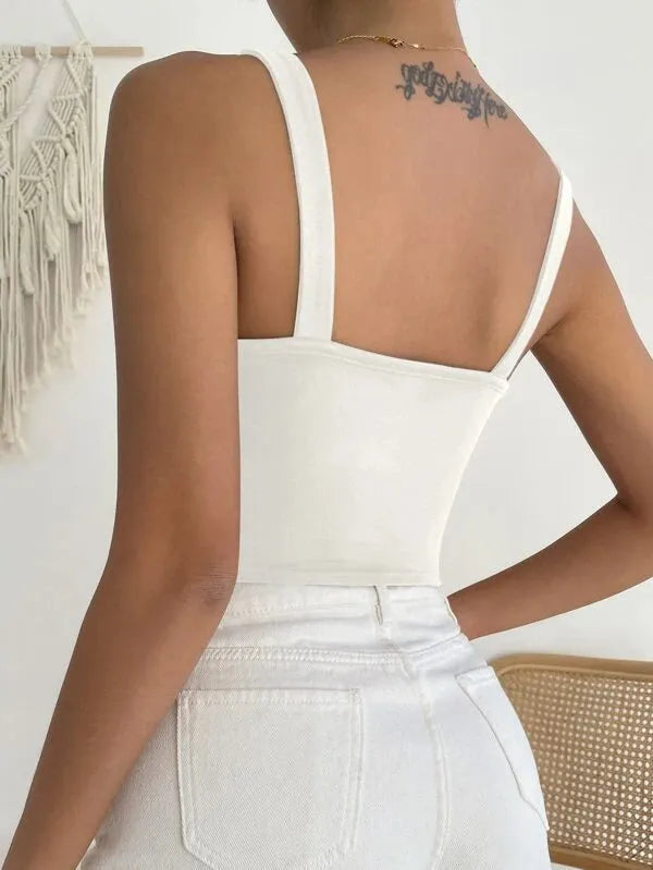 Person wearing a white sleeveless top with thin straps, standing against a neutral background - BlackBole High Quality Western Dress