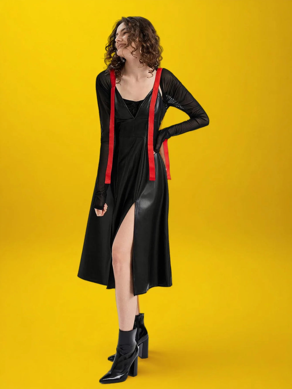 Woman wearing a black dress with red suspenders against a yellow background - BlackBole High Quality Western Dress