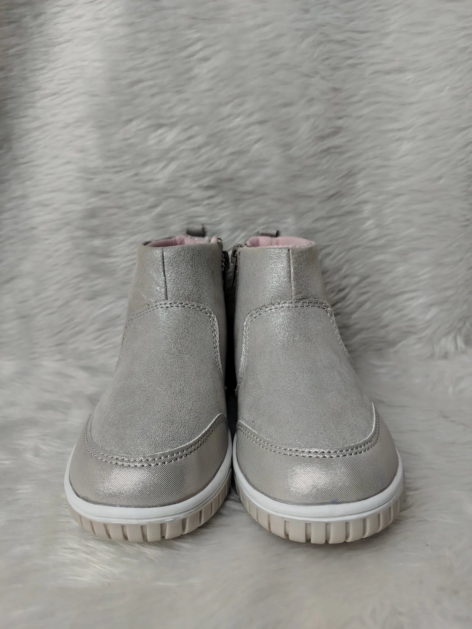 Pair of gray ankle boots on a textured gray surface - BlackBole High Quality Shoe