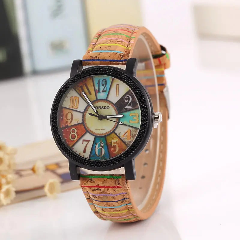 A woman's quartz watch with a floral surface and wood grain pattern, featuring a round multicolored dial and a brown leather band - BlackBole High Quality Watch