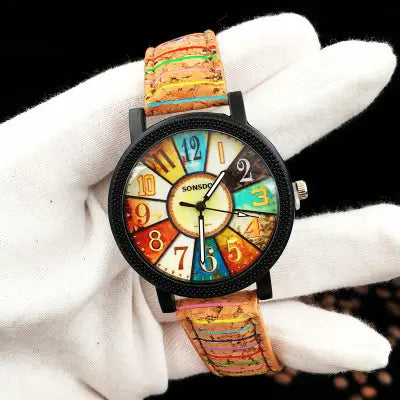 A woman's quartz watch with a floral surface and wood grain pattern, featuring a round multicolored dial and a brown leather band - BlackBole High Quality Watch