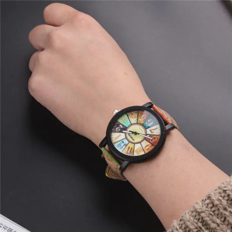 A woman's quartz watch with a floral surface and wood grain pattern, featuring a round multicolored dial and a brown leather band - BlackBole High Quality Watch