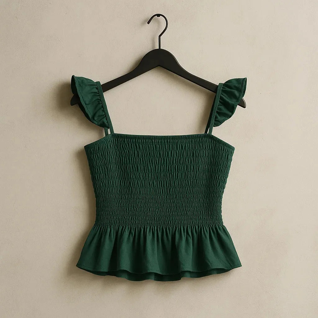 Green top with ruffled straps on a hanger against a beige background - BlackBole High Quality Western Dress