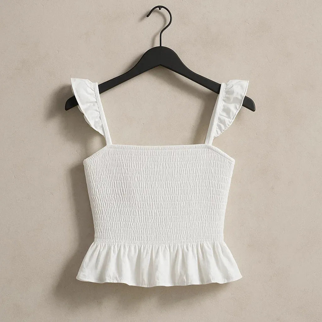 White ruffled top on a black hanger against a beige background - BlackBole High Quality Western Dress