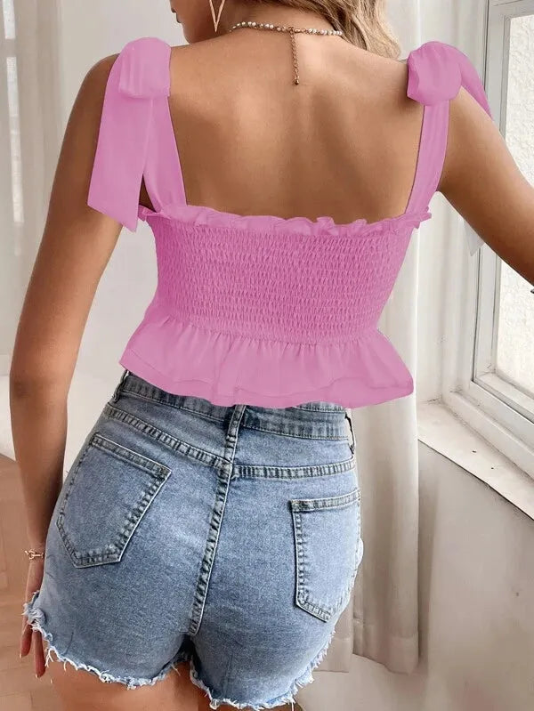 Person wearing a pink top and denim shorts indoors - BlackBole High Quality Western Dress