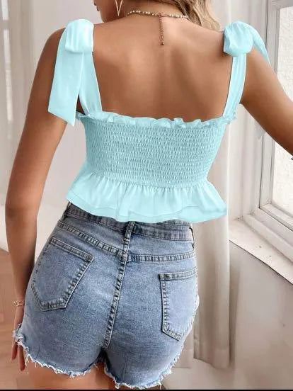Light blue top and denim shorts worn by a person indoors - BlackBole High Quality Western Dress