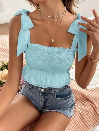 Light blue top with bow straps worn by a person, sitting on a checkered surface - BlackBole High Quality Western Dress