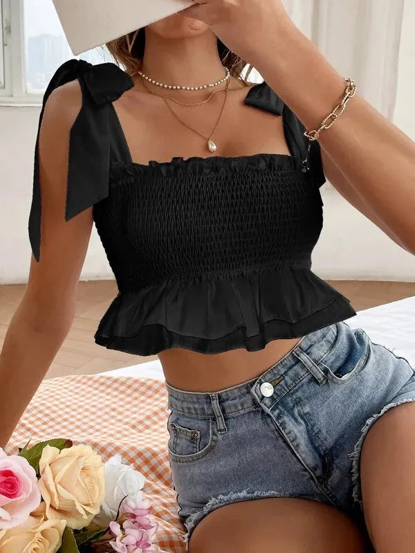 Woman wearing a black smocked top and denim shorts with a white hat indoors - BlackBole High Quality Western Dress