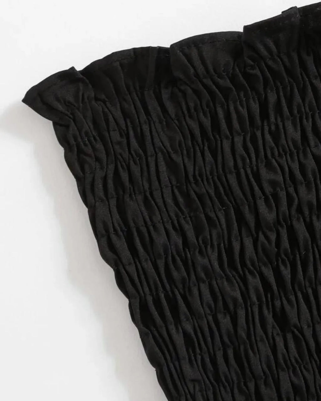 Close-up of a black textured fabric on a white background - BlackBole High Quality Western Dress