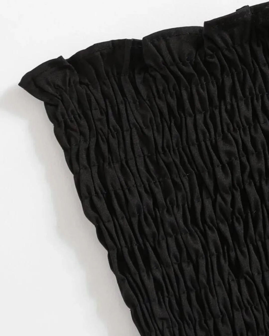 Close-up of a black textured fabric on a white background - BlackBole High Quality Western Dress