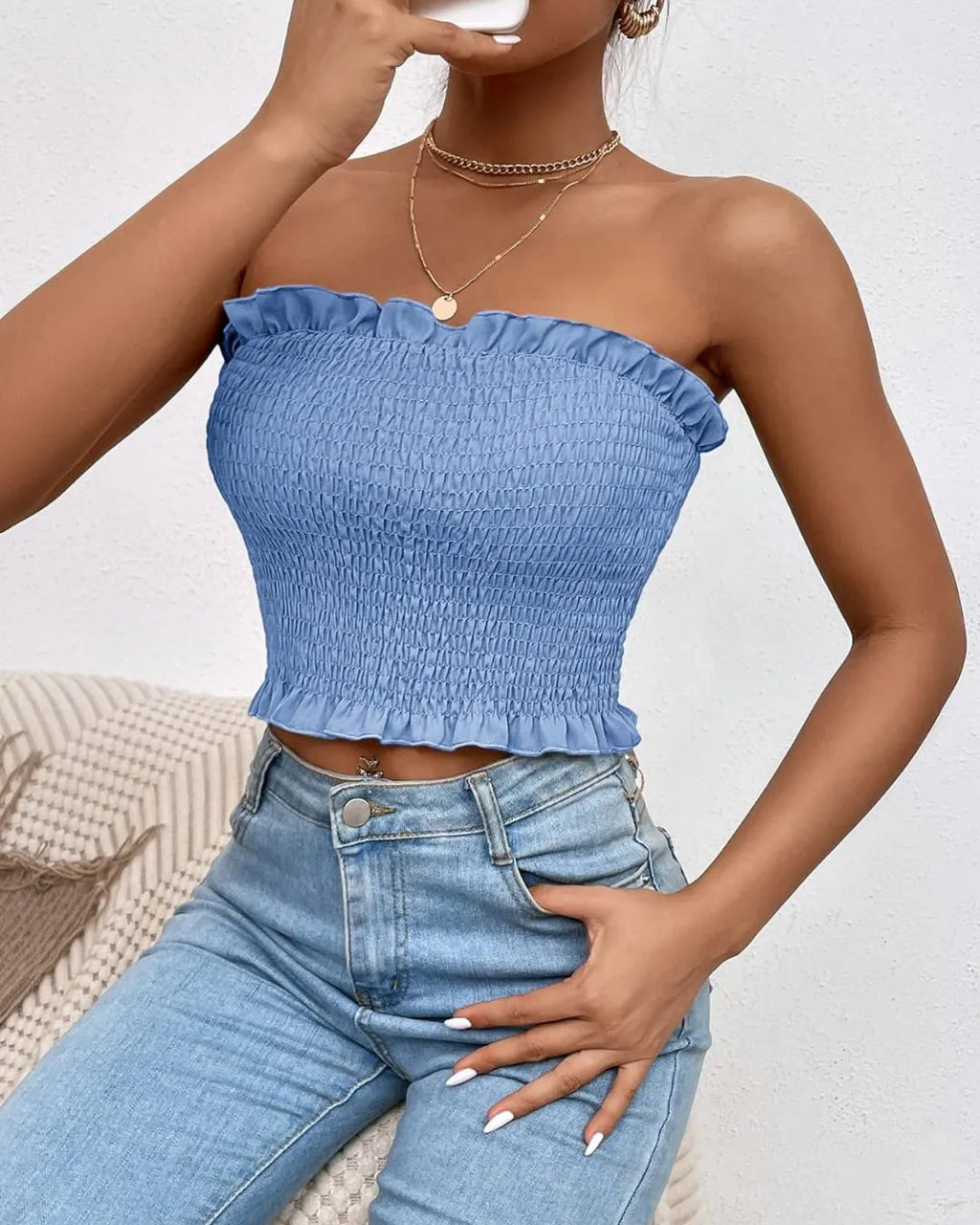 Woman wearing a blue strapless top and jeans on a neutral background - BlackBole High Quality Western Dress